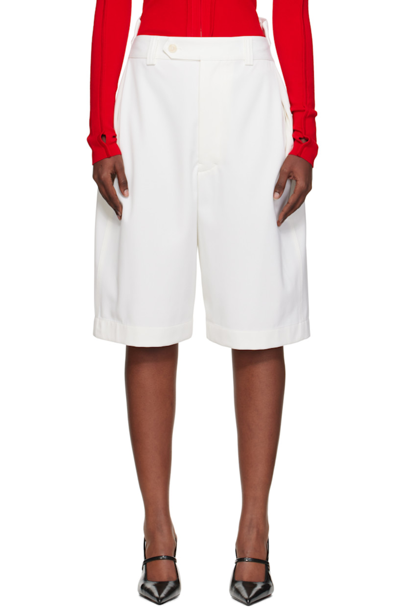 Wool-blend twill shorts.

· High-rise
· Belt loops
· Two-pocket styling
· Zip fly 
· Notch at back waistband
· Adjustable button tab at back waist
· Full plain-woven cotton-blend lining 

Supplier color: Ivory
