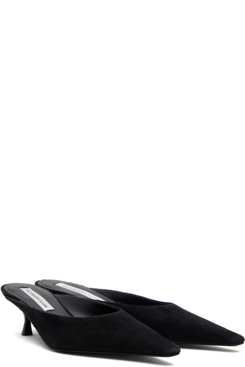 Brushed goatskin suede mules.

· Pointed square toe 
· Logo patch at padded footbed
· Leather lining
· Kitten heel with rubber injection
· Calfskin sole 
· Heel: H2"

Supplier color: Black