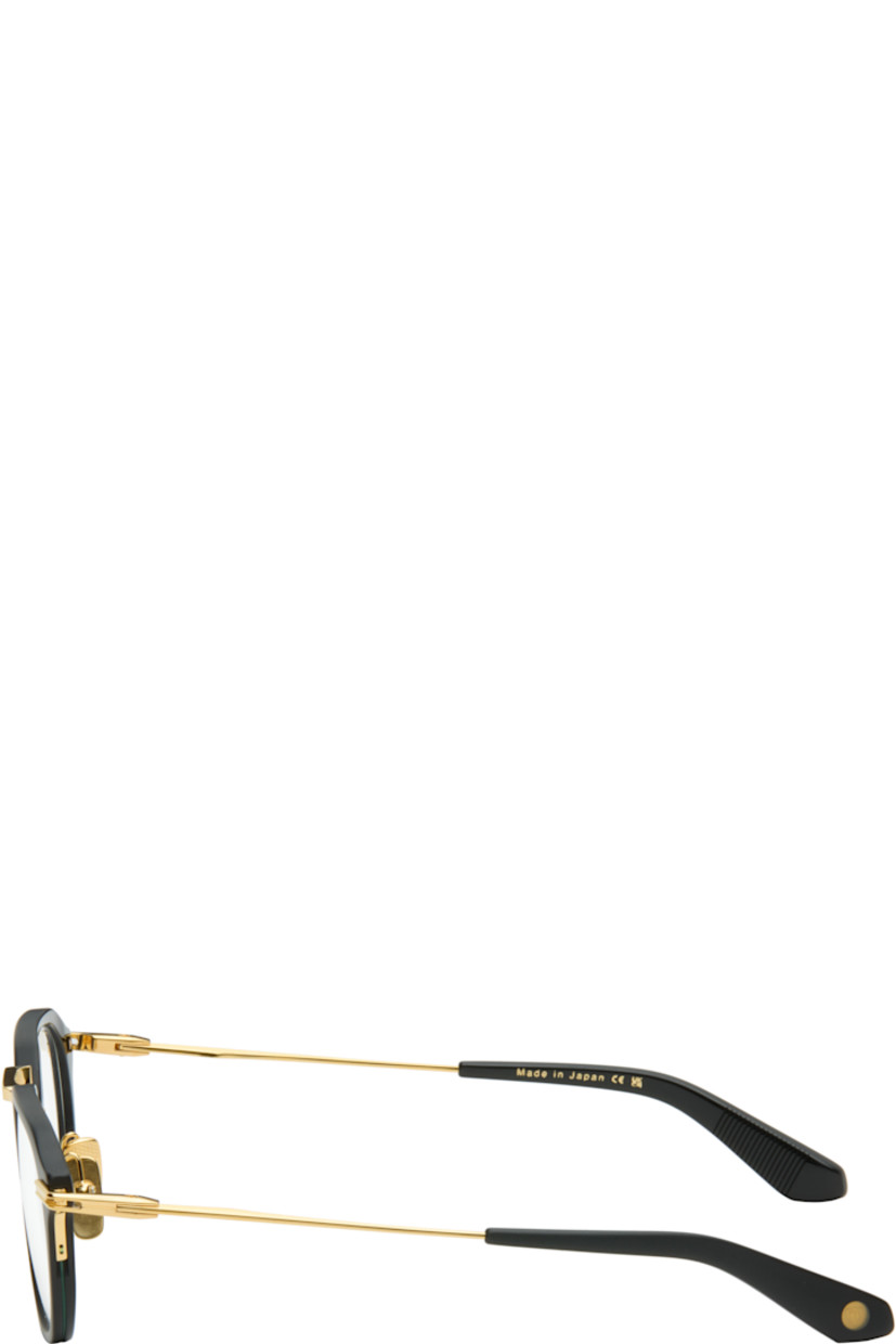 Handcrafted round titanium- and acetate-frame optical glasses.

· Adjustable titanium nose pads
· Cutout at temples 
· Inset logo at temple tip
· Includes case
· Size: 49.21 140

Supplier color: Matte black/Gold