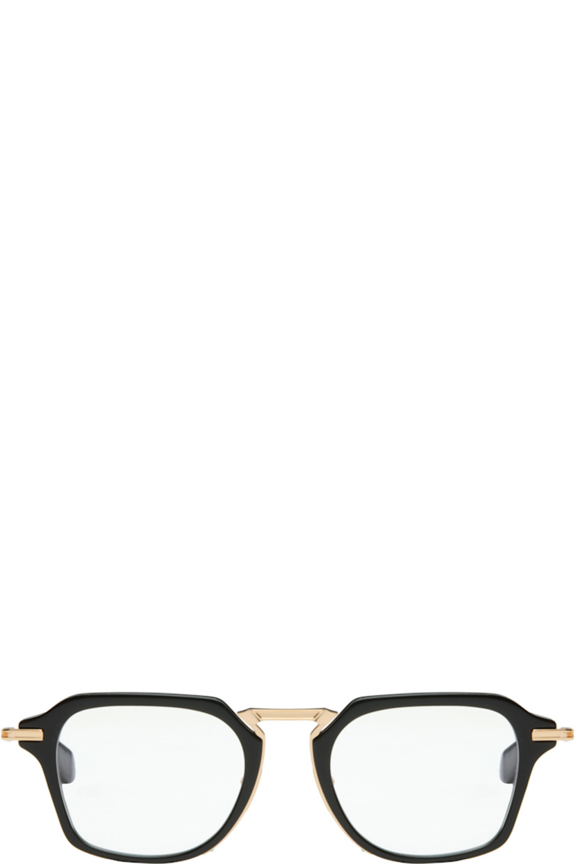 Handcrafted square titanium- and acetate-frame optical glasses.

· Logo etched at lens
· Adjustable metal nose pads
· Black acetate temple tips
· Inset logo at temple tip
· Includes case
· Size: 51.21 140

Supplier color: Black/White gold