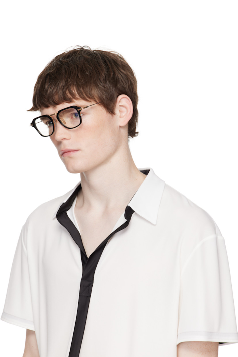 Handcrafted square titanium- and acetate-frame optical glasses.

· Logo etched at lens
· Adjustable metal nose pads
· Black acetate temple tips
· Inset logo at temple tip
· Includes case
· Size: 51.21 140

Supplier color: Black/White gold