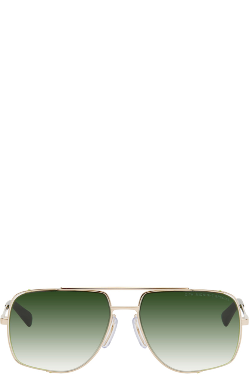 Aviator-style titanium-frame sunglasses in gold tone. 

· Handcrafted 
· Anti-reflective CR-39 green lenses
· 100% UVA/UVB protection
· Logo etched at lens
· Adjustable rubber nose pads
· Double bridge
· Engraved detailing at temples
· Transparent green acetate temple tips
· Inset logo hardware at single tip
· Includes case
· Size: 50.16 140

Supplier color: White gold/Crystal black moss