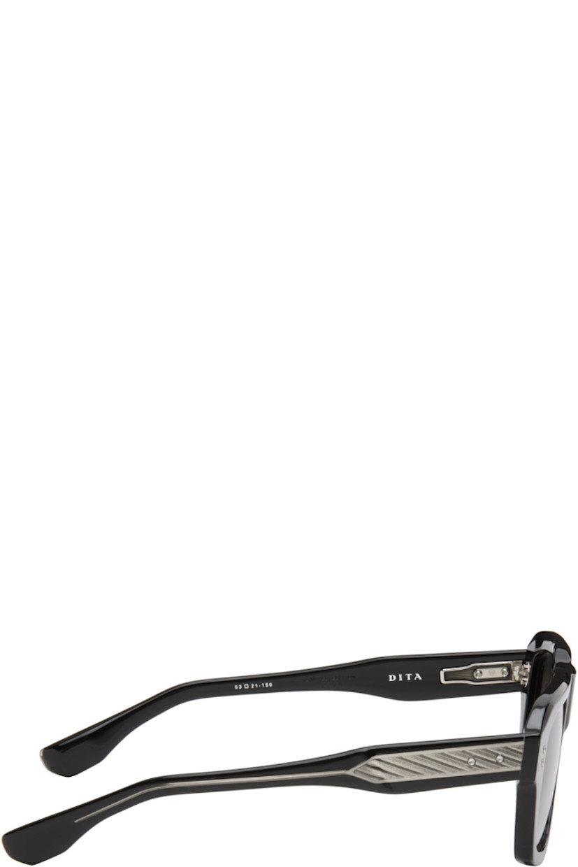 Handcrafted square acetate-frame sunglasses in black.

· Anti-reflective gray lenses
· 100% UVA/UVB protection
· Logo and text etched at lenses
· Integrated nose pads
· Exposed core wires
· Inset logo hardware at temple tip
· Silver-tone hardware 
· Includes case 
· Size: 53.21 150

This item is part of a limited run of 450.

Supplier color: Black