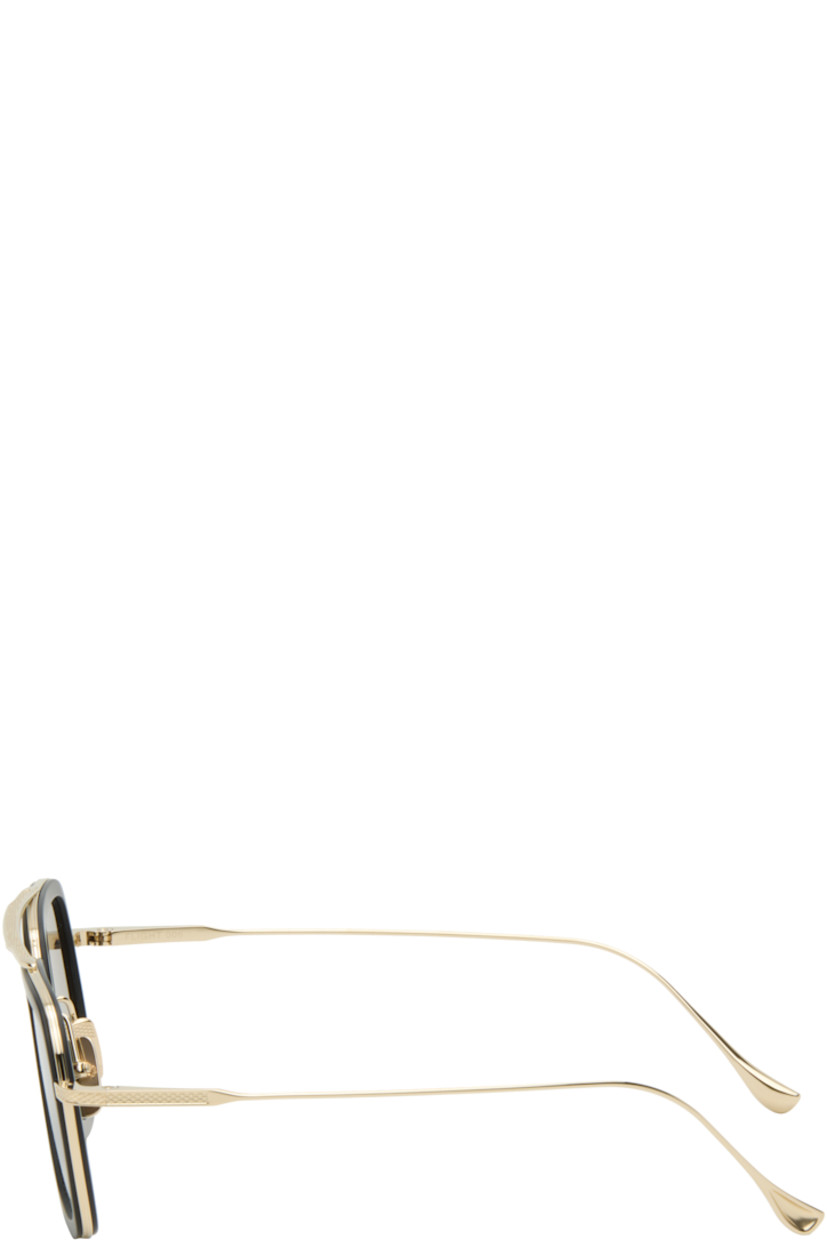 Handcrafted aviator-style titanium- and acetate-frame sunglasses.

· Anti-reflective CR-39 gray lenses
· Logo etched at lens
· 100% UVA/UVB protection
· Adjustable titanium nose pads
· Double bridge
· Includes case
· Size: 52.22 144

Supplier color: Matte black/14K gold