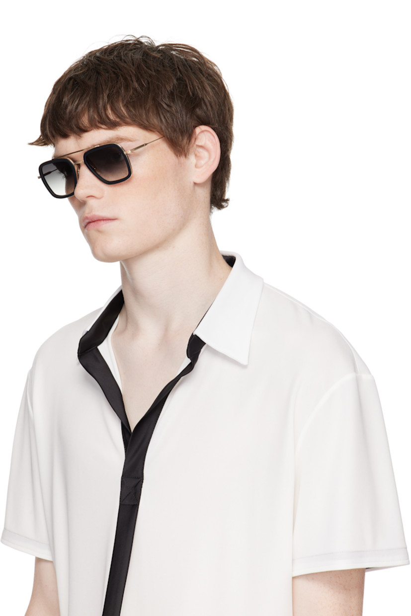 Handcrafted aviator-style titanium- and acetate-frame sunglasses.

· Anti-reflective CR-39 gray lenses
· Logo etched at lens
· 100% UVA/UVB protection
· Adjustable titanium nose pads
· Double bridge
· Includes case
· Size: 52.22 144

Supplier color: Matte black/14K gold