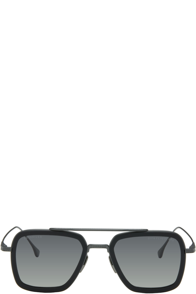 Handcrafted aviator-style titanium- and acetate-frame sunglasses.

· Anti-reflective CR-39 gray lenses
· Logo etched at lens
· 100% UVA/UVB protection
· Adjustable titanium nose pads
· Double bridge
· Includes case
· Size: 52.22 144

Supplier color: Black iron/Matte black