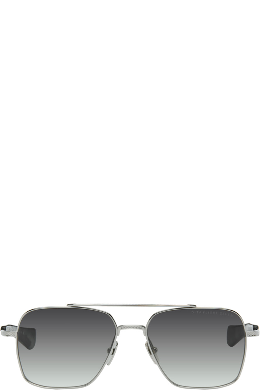 Handcrafted aviator-style titanium-frame sunglasses.

· Anti-reflective CR-39 gray lenses
· Logo etched at lens
· 100% UVA/UVB protection
· Top bar
· Adjustable titanium nose pads
· Blue tortoiseshell acetate temple tips 
· Inset logo at temple tip
· Includes case
· Size: 57.16 144

Supplier color: Black palladium