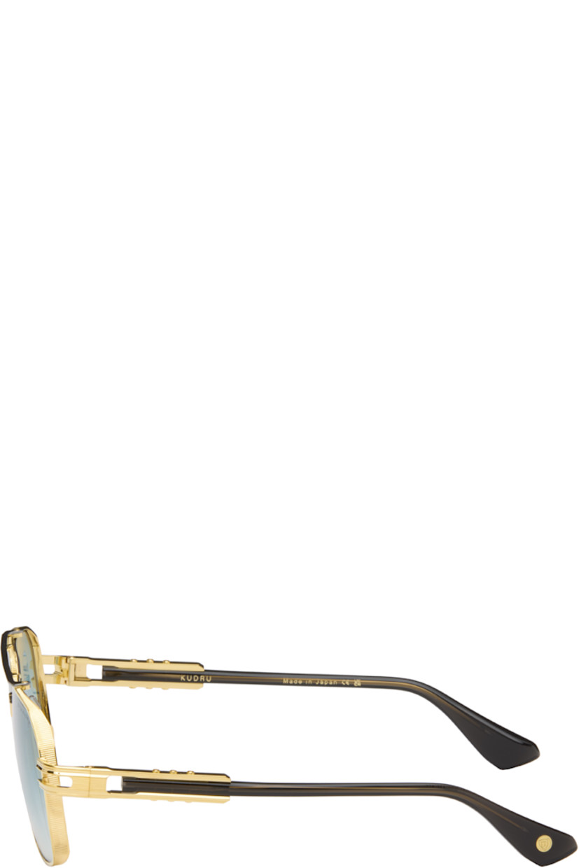 Handcrafted aviator-style titanium-frame sunglasses.

· Anti-reflective CR-39 blue lenses 
· Logo etched at lens 
· 100% UVA/UVB protection 
· Adjustable metal nose pads
· Double bridge 
· Fluted detailing at temples
· Black acetate temple tips 
· Includes case 
· Size: 61.14 145-155

Available exclusively at SSENSE.

Supplier color: Yellow gold