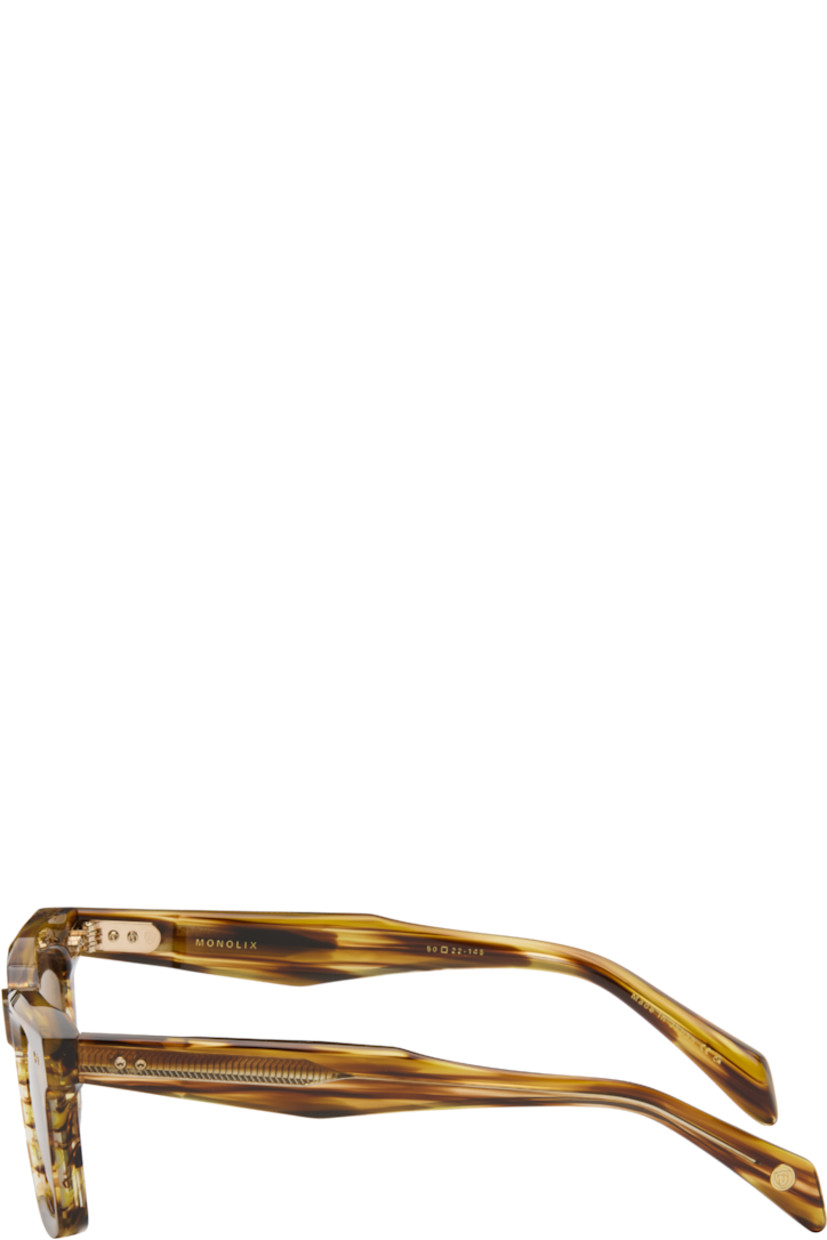 Square semi-transparent tortoiseshell acetate-frame sunglasses.

· Handcrafted
· Logo etched at lens
· Anti-reflective CR-39 brown lenses
· 100% UVA/UVB protection
· Integrated nose pads
· Core wire at temples
· Inset logo at temple tips
· Includes case
· Size: 50.22 148

Supplier color: Brown hazel