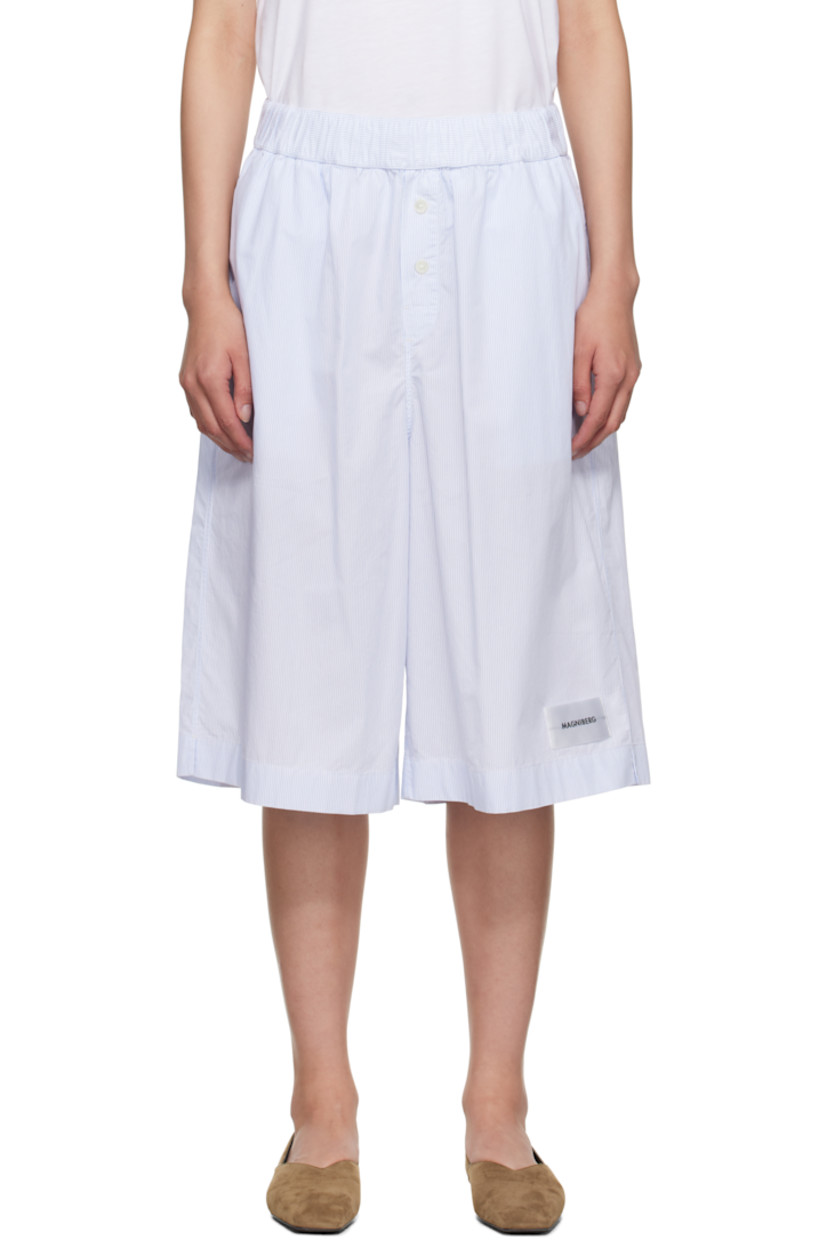 Mercerized pima cotton poplin pyjama shorts.

· Striped throughout
· Concealed drawstring at elasticized waistband
· Two-pocket styling
· Exposed button fly
· Logo patch at hem
· Vented cuffs
· Mother-of-pearl hardware

Supplier color: Light blue mini stripes