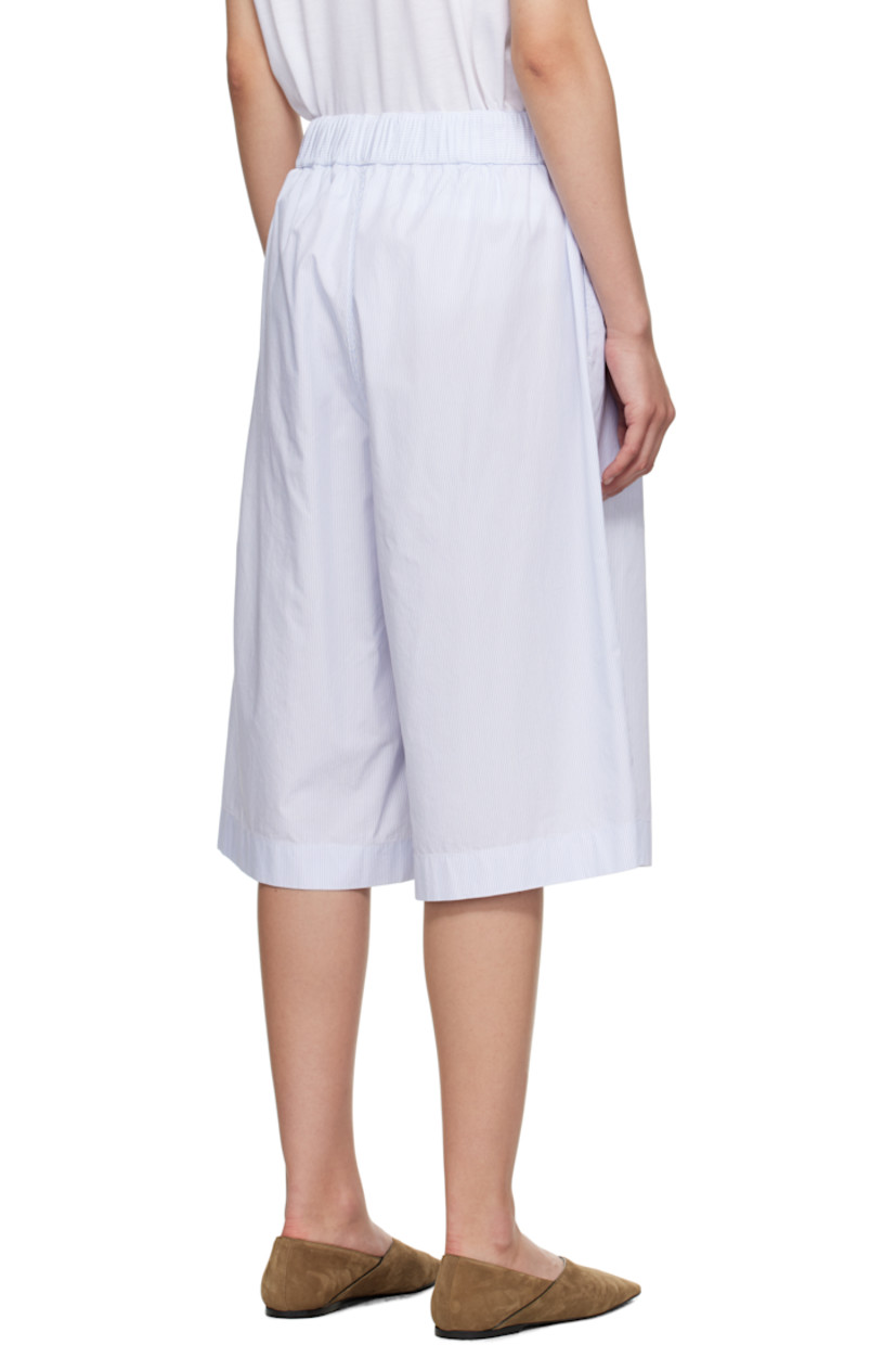 Mercerized pima cotton poplin pyjama shorts.

· Striped throughout
· Concealed drawstring at elasticized waistband
· Two-pocket styling
· Exposed button fly
· Logo patch at hem
· Vented cuffs
· Mother-of-pearl hardware

Supplier color: Light blue mini stripes