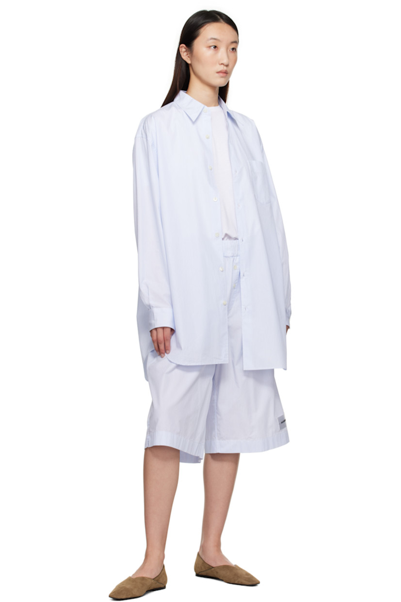 Mercerized pima cotton poplin pyjama shorts.

· Striped throughout
· Concealed drawstring at elasticized waistband
· Two-pocket styling
· Exposed button fly
· Logo patch at hem
· Vented cuffs
· Mother-of-pearl hardware

Supplier color: Light blue mini stripes