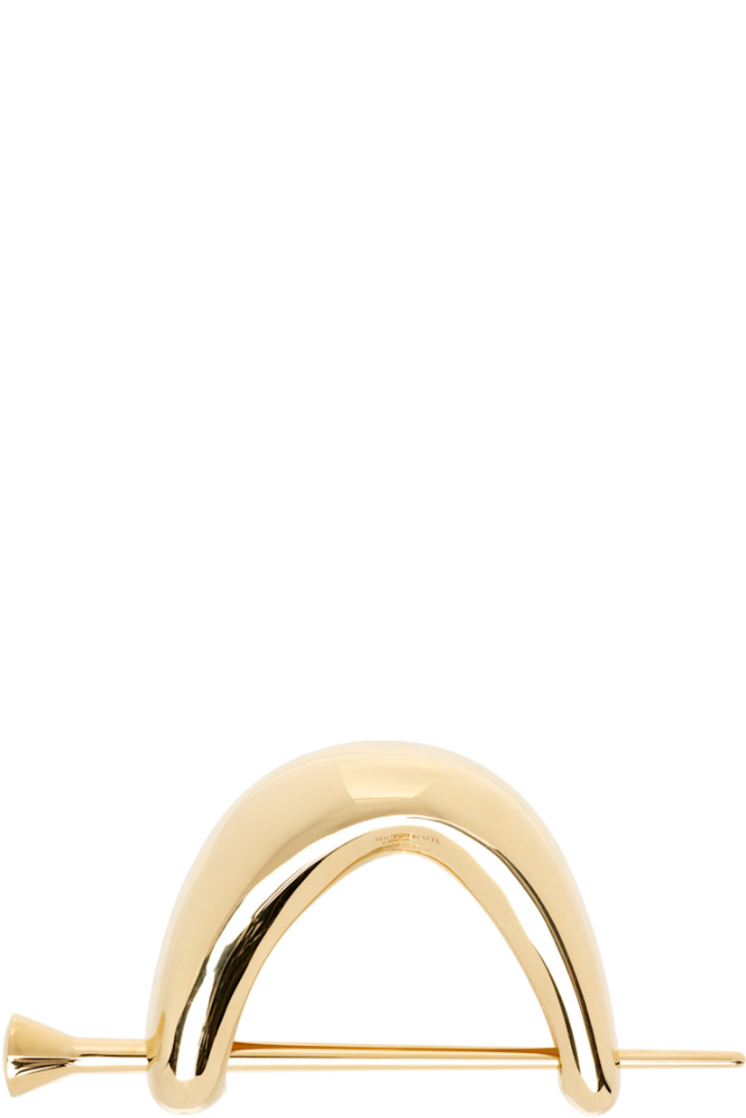 Hair pin in 18k yellow gold-plated sterling silver.

H1.5" x W3"

Supplier color: Yellow gold
