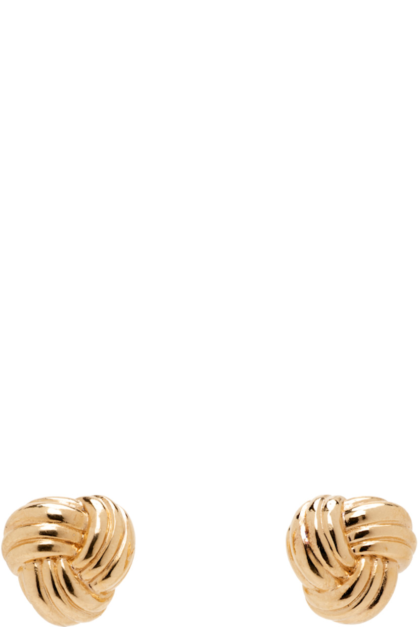 Pair of stud earrings in 18k yellow gold-plated sterling silver.

· Post-stud fastening
· D0.25"

Supplier color: Yellow gold