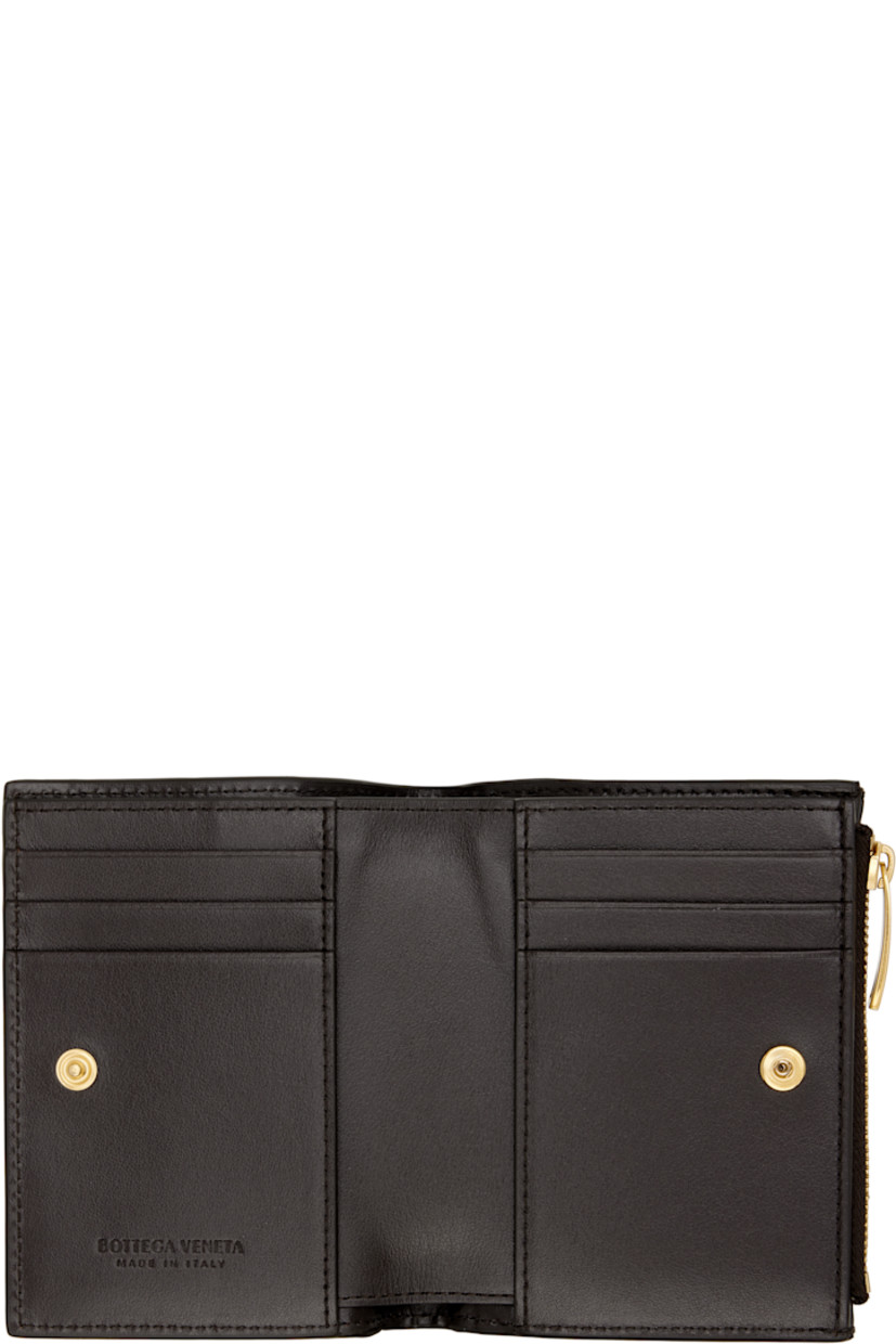 Intrecciato-woven grained nappa leather wallet. 

· Zip coin compartment at side
· Press-stud closure
· Six card slots and two patch pockets
· Single note slot
· Grained lambskin lining
· H4.5" x W3.5"

Supplier color: Fondant