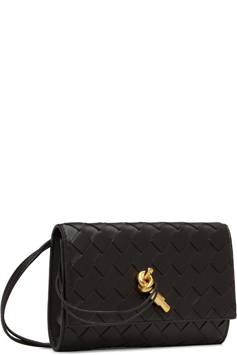 Intrecciato-woven lambskin shoulder bag.

· Sliding cord shoulder strap
· Knot hardware at tab-slot flap
· Card slots at calfskin interior
· Gold-tone hardware
· H5" x W7.5" x D1"

Supplier color: Fondant