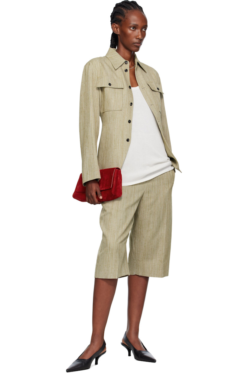 Slub viscose- and silk-blend canvas jacket.

· Spread collar
· Button closure
· Flap pockets at chest
· Darts at waist
· Princess seams at back
· Full satin twill lining

Supplier color: Algae