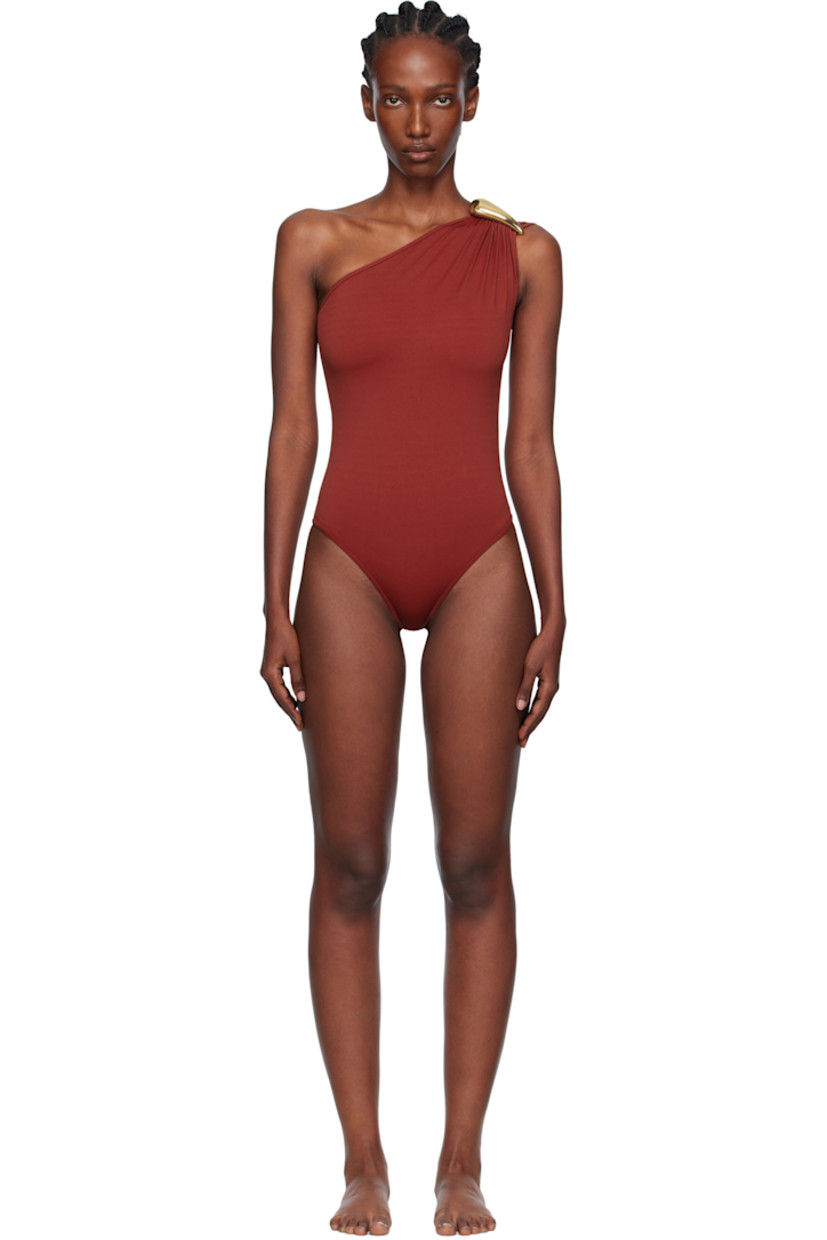 Stretch nylon one-piece swimsuit.

· Single-shoulder construction
· Sculptural hardware at shoulder
· Partially lined

Supplier color: Lava
