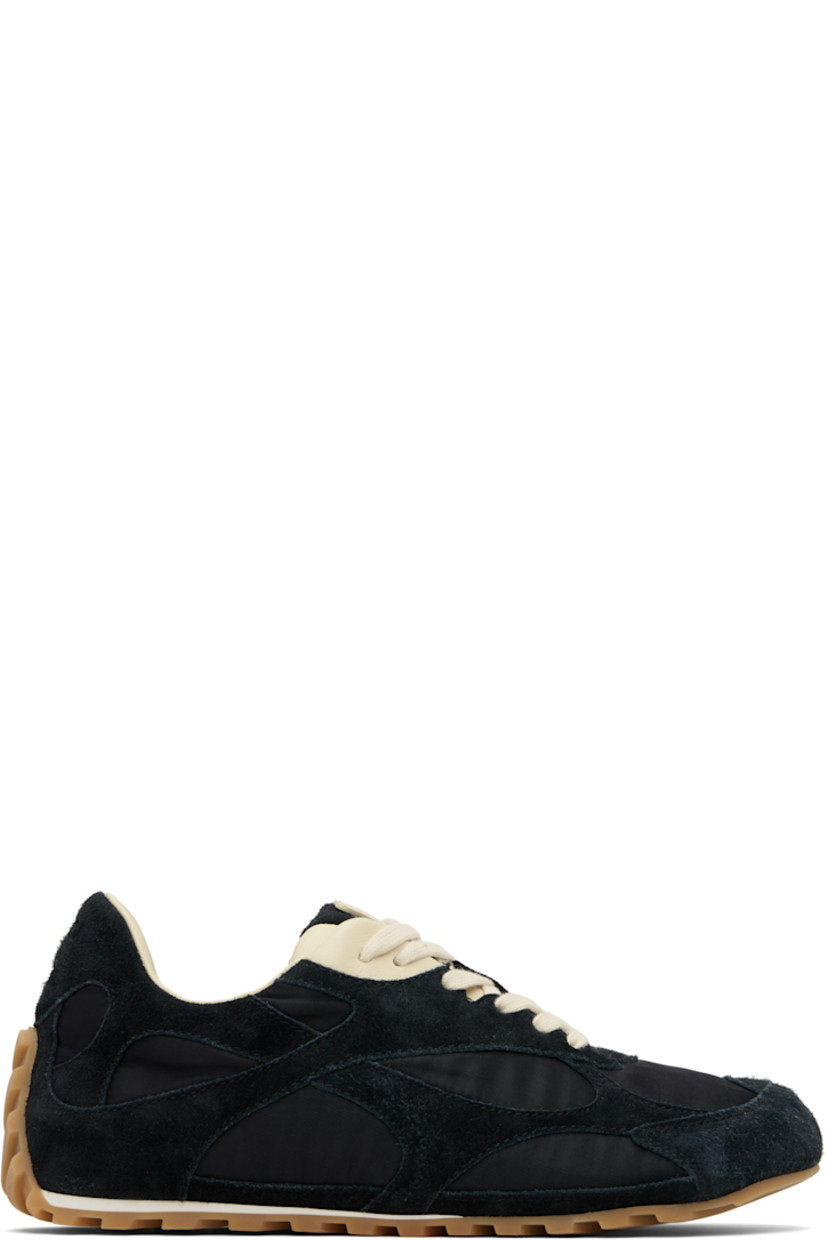 Low-top lambskin suede and nylon taffeta sneakers.

· Lace-up closure
· Logo patch at padded tongue
· Padded collar
· Logo embossed at heel tab
· Buffed calfskin lining
· Treaded rubber sole

Supplier color: Black