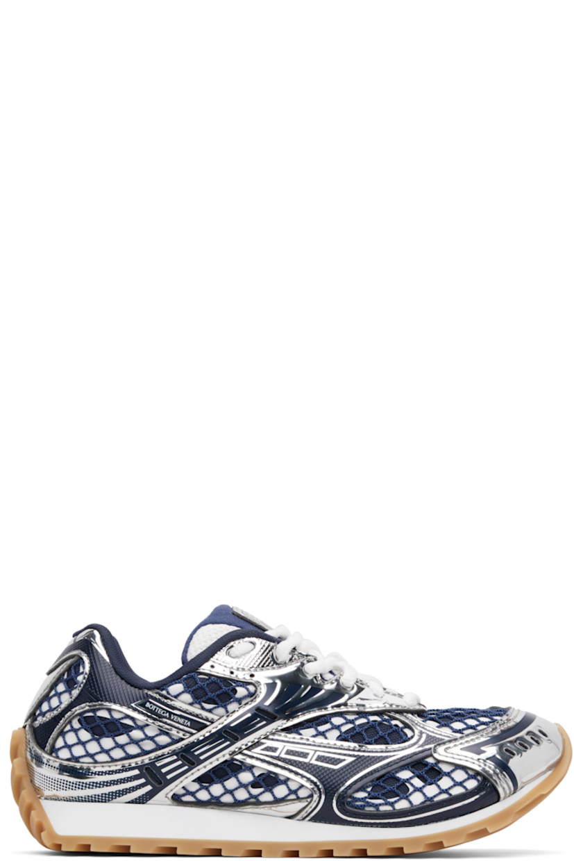 Low-top patent calfskin and mesh sneakers.

· Lace-up closure
· Logo patch at padded tongue
· Padded collar
· Logo printed at outer side
· Mesh lining
· Foam rubber midsole
· Treaded rubber sole

Supplier color: Abyss/Silver