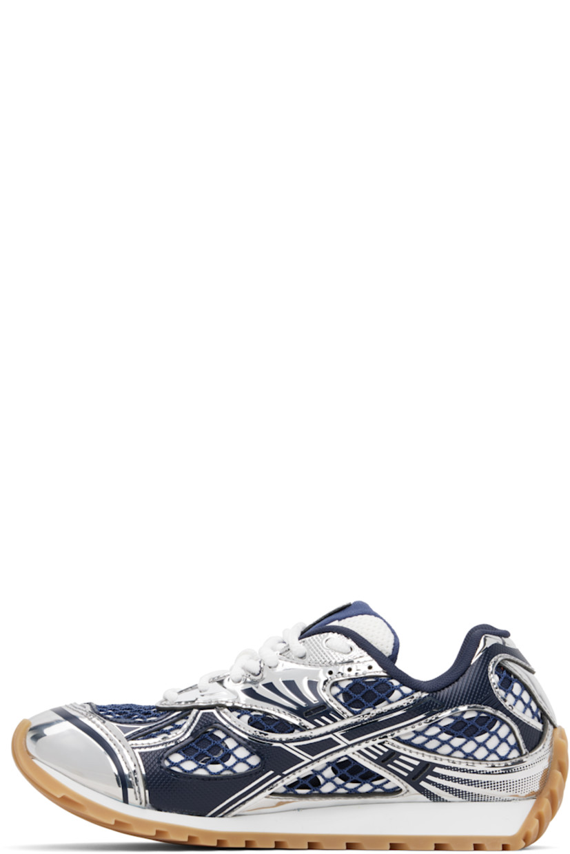 Low-top patent calfskin and mesh sneakers.

· Lace-up closure
· Logo patch at padded tongue
· Padded collar
· Logo printed at outer side
· Mesh lining
· Foam rubber midsole
· Treaded rubber sole

Supplier color: Abyss/Silver