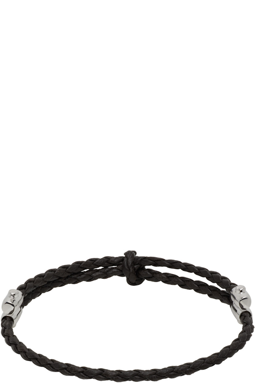 Braided buffed nappa leather bracelet in brown. 

· Knot at face 
· Pull-through fastening 
· Sterling silver hardware 

Supplier color: Fondant