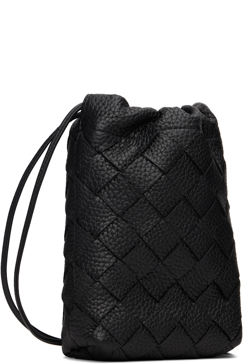 Intrecciato-woven grained calfskin pouch.

· Twin shoulder straps
· Connecting tab at straps for crossbody styling
· Drawstring closure
· Nylon taffeta lining
· H7" x W5.5" x D2"

Supplier color: Black