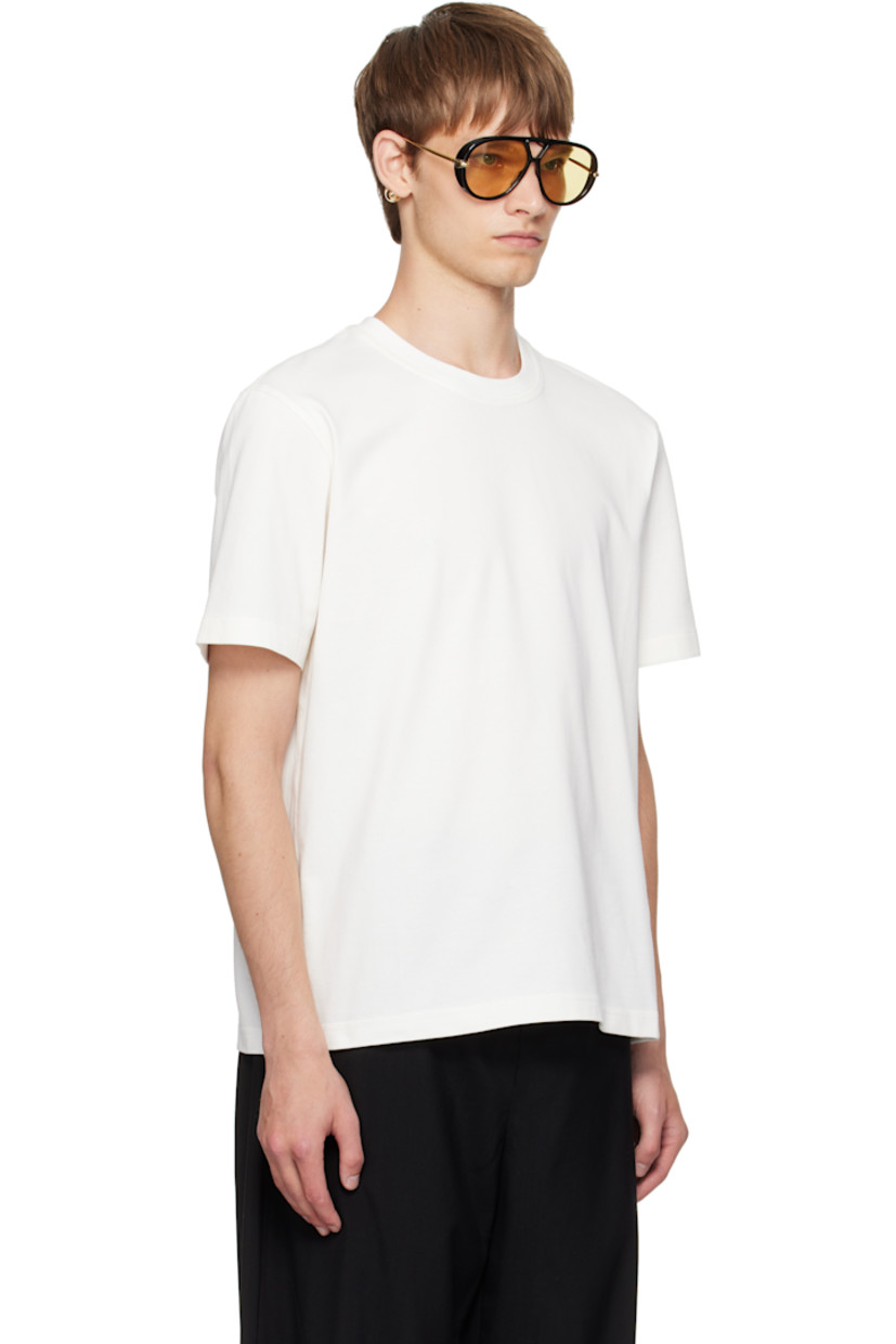 Cotton jersey T-shirt. 

· Rib-knit crewneck
· Graphic embroidered at front hem 

Supplier color: Chalk