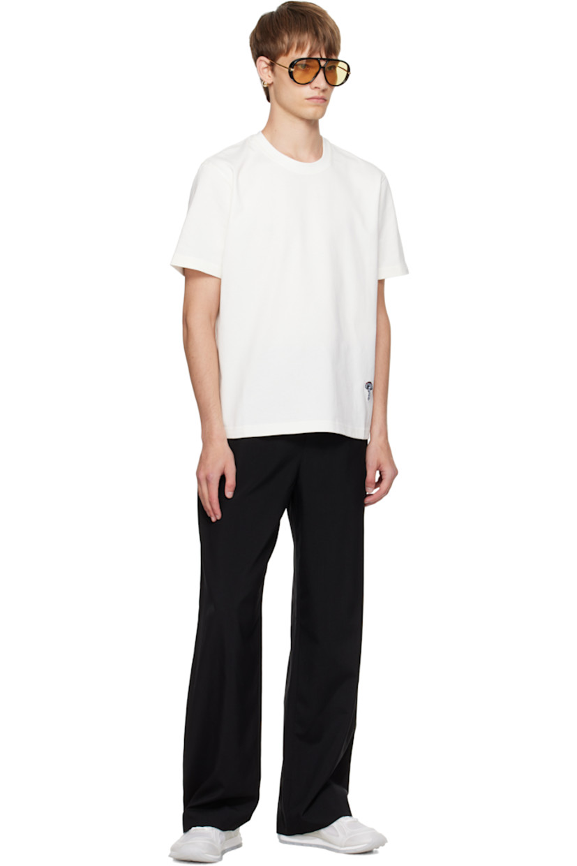 Cotton jersey T-shirt. 

· Rib-knit crewneck
· Graphic embroidered at front hem 

Supplier color: Chalk