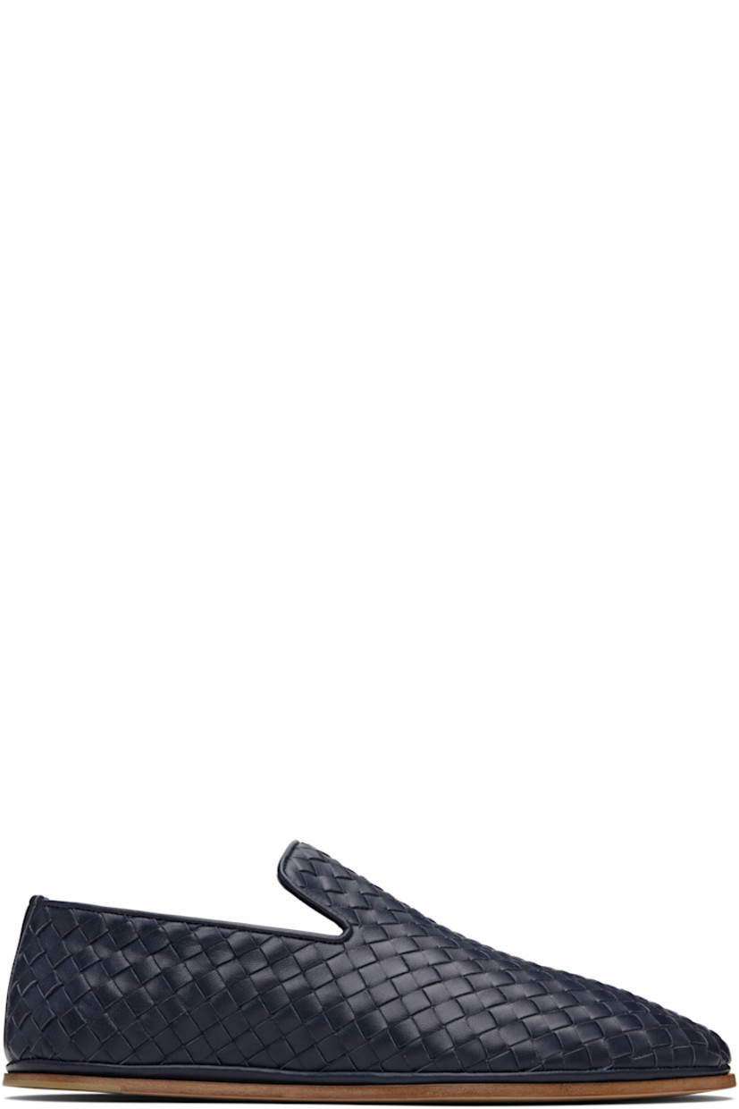 Intrecciato-woven buffed lambskin slippers.

· Logo embossed at padded footbed
· Leather sole with rubber injection

Supplier color: Abyss