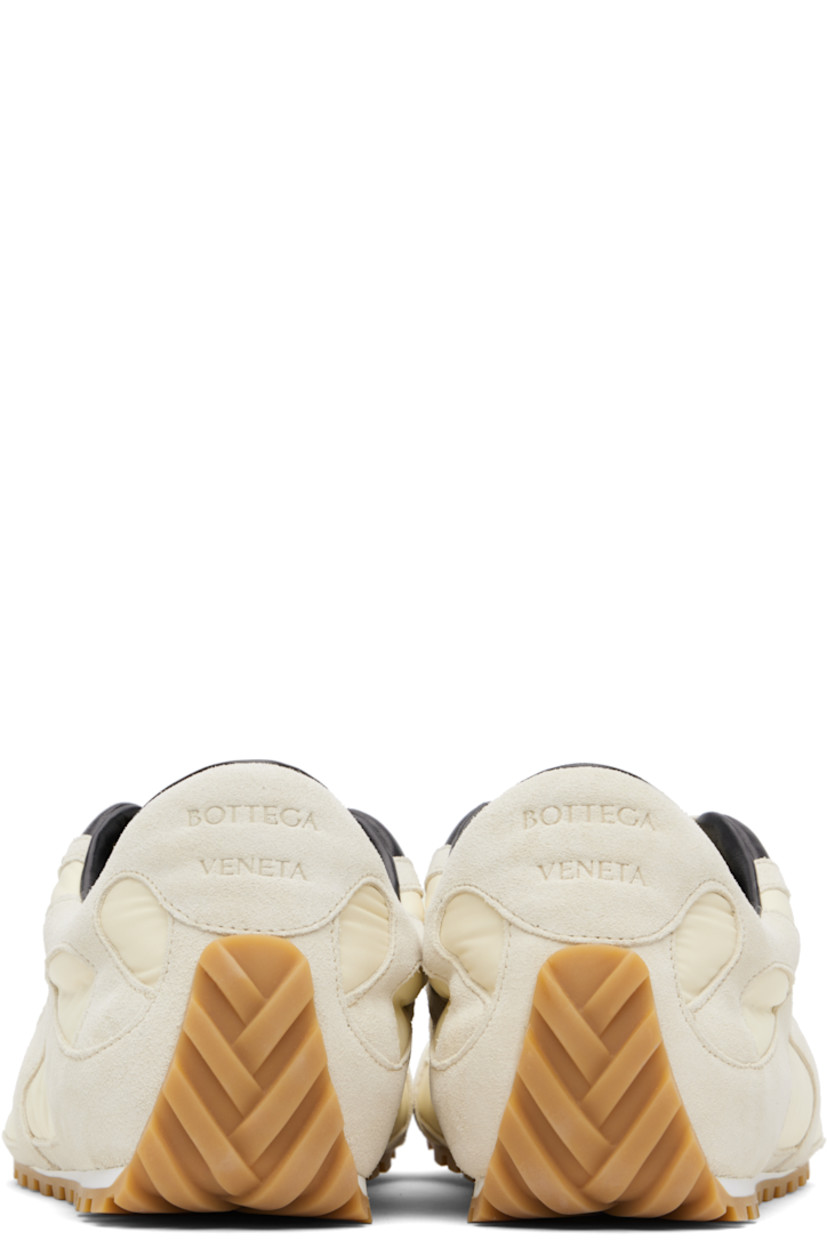 Low-top suede and nylon taffeta sneakers.

· Lace-up closure
· Logo patch at padded tongue
· Padded collar
· Logo embossed at heel tab
· Buffed lambskin lining
· Treaded rubber sole

Supplier color: Sea salt/Black