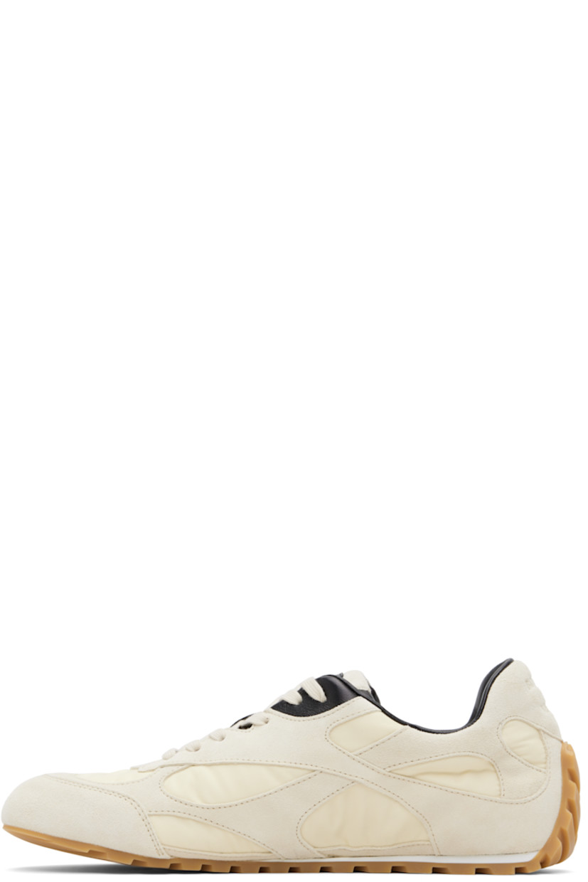 Low-top suede and nylon taffeta sneakers.

· Lace-up closure
· Logo patch at padded tongue
· Padded collar
· Logo embossed at heel tab
· Buffed lambskin lining
· Treaded rubber sole

Supplier color: Sea salt/Black