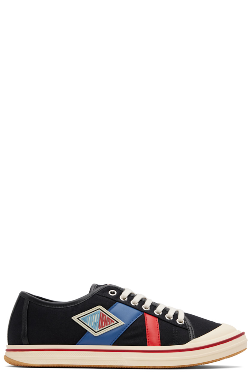 Low-top canvas and buffed leather sneakers.

· Rubber cap toe
· Lace-up closure
· Logo hardware at tongue
· Rubberized logo patch at outer side
· Metal eyelets at inner side
· Treaded rubber sole

Supplier color: Black