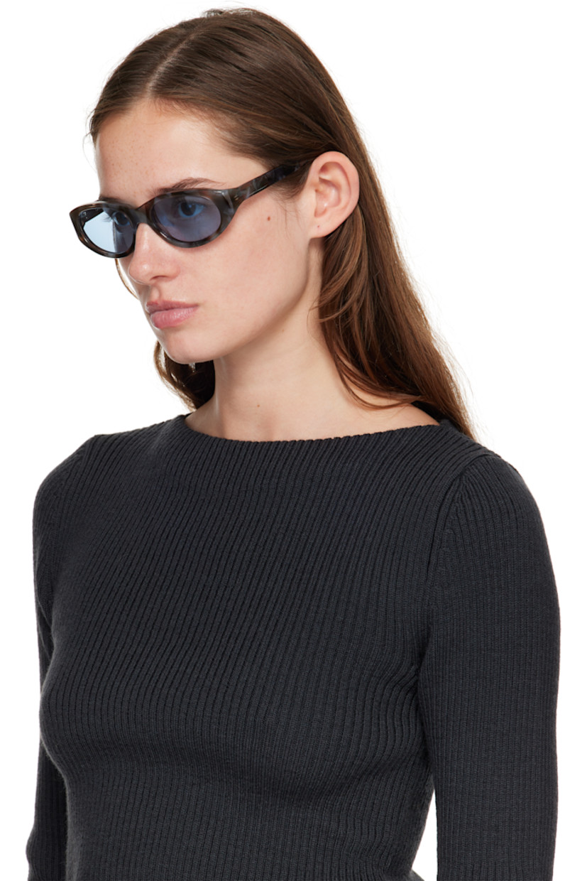 Handcrafted oval Mazzucchelli acetate-frame sunglasses.

· Semi-sheer
· Blue-tinted Carl Zeiss lenses, cat. 1
· Core wire at temples
· Hinged leather case included

Supplier color: Dotonbori Havana