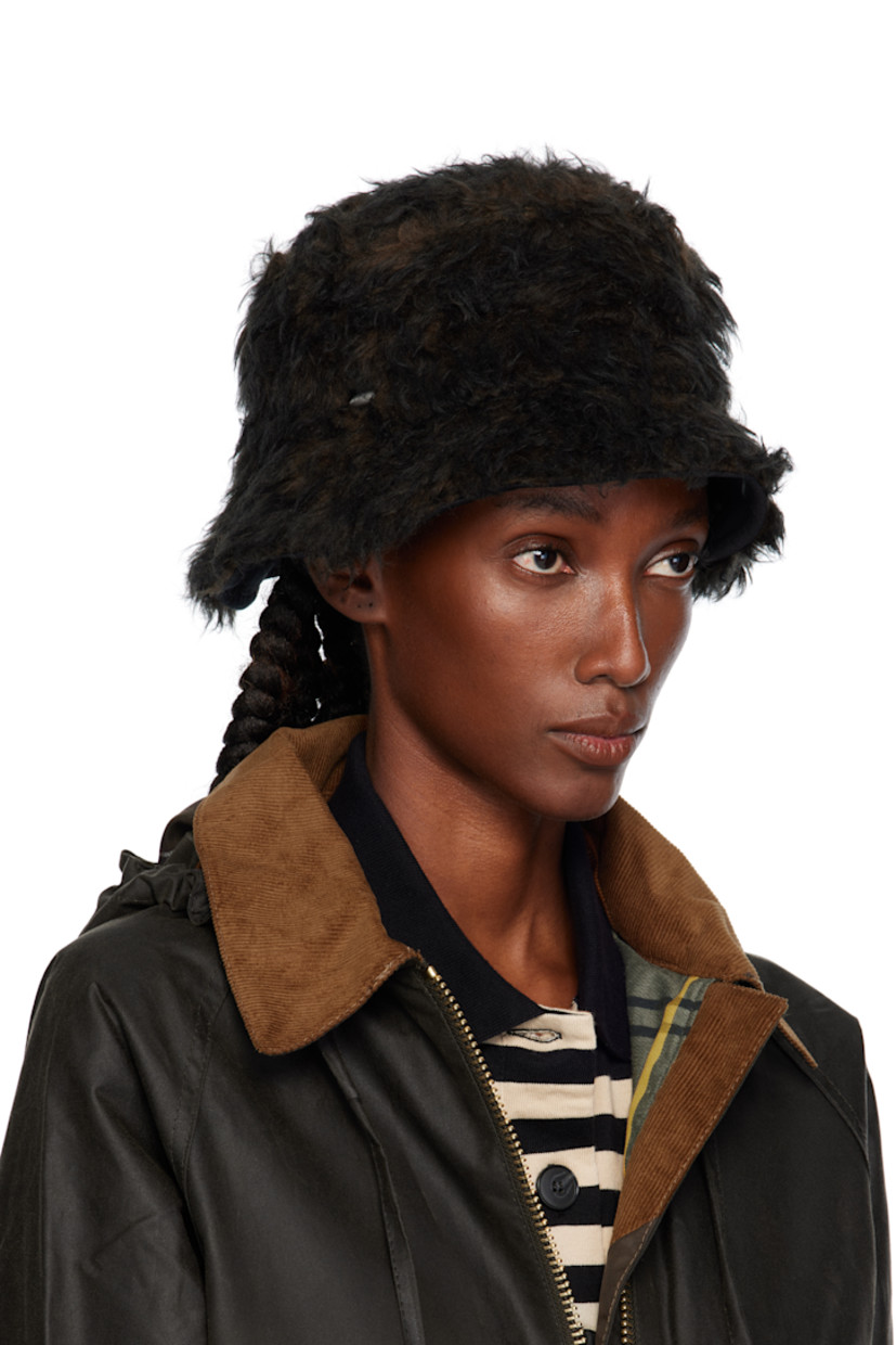 Fleece bucket hat.

· Logo hardware at face
· Twill lining

Supplier color: Ombre brown hair wool