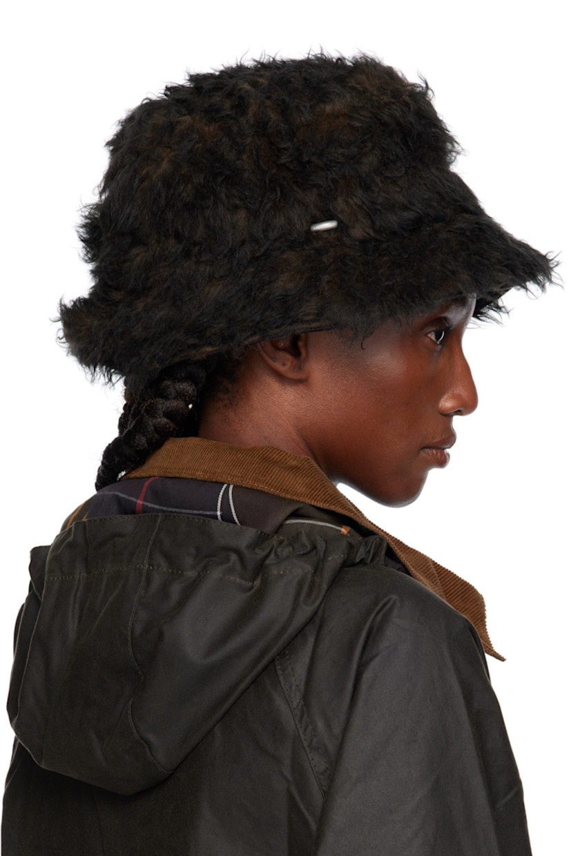 Fleece bucket hat.

· Logo hardware at face
· Twill lining

Supplier color: Ombre brown hair wool