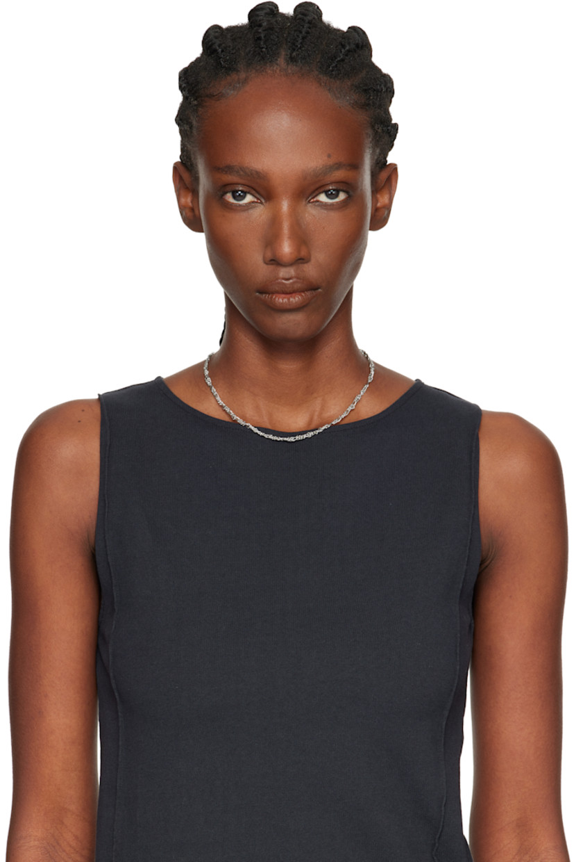 Modified figaro chain necklace in silver-tone brass.

· Adjustable lobster-clasp fastening 
· L18"

Supplier color: Surgical brass