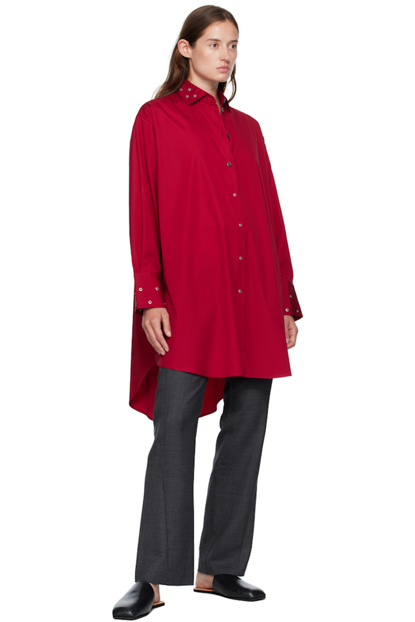 Cotton poplin midi dress.

· Grommets throughout 
· Spread collar 
· Button closure
· Shirttail hem
· Buttoned vent at side seams
· Buttoned barrel cuffs
· Mother-of-pearl hardware

Supplier color: Lipstick red super poplin