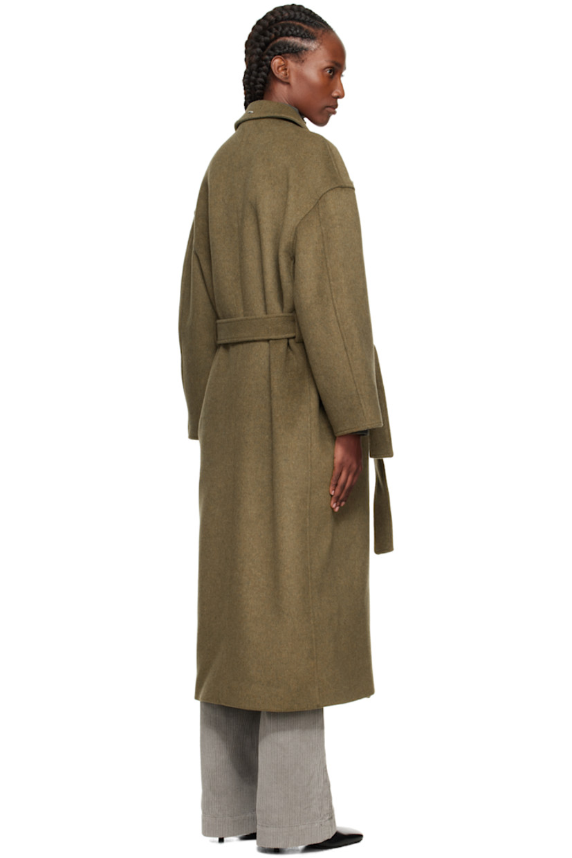 Wool-blend melton coat. 

· Spread collar 
· Concealed double-breasted button closure
· Welt pockets at waist
· Belt loops at waist 
· Detachable self-tie belt 
· Full satin twill lining
· Corozo hardware 
 
Supplier color: Disruptive moss kilo melton