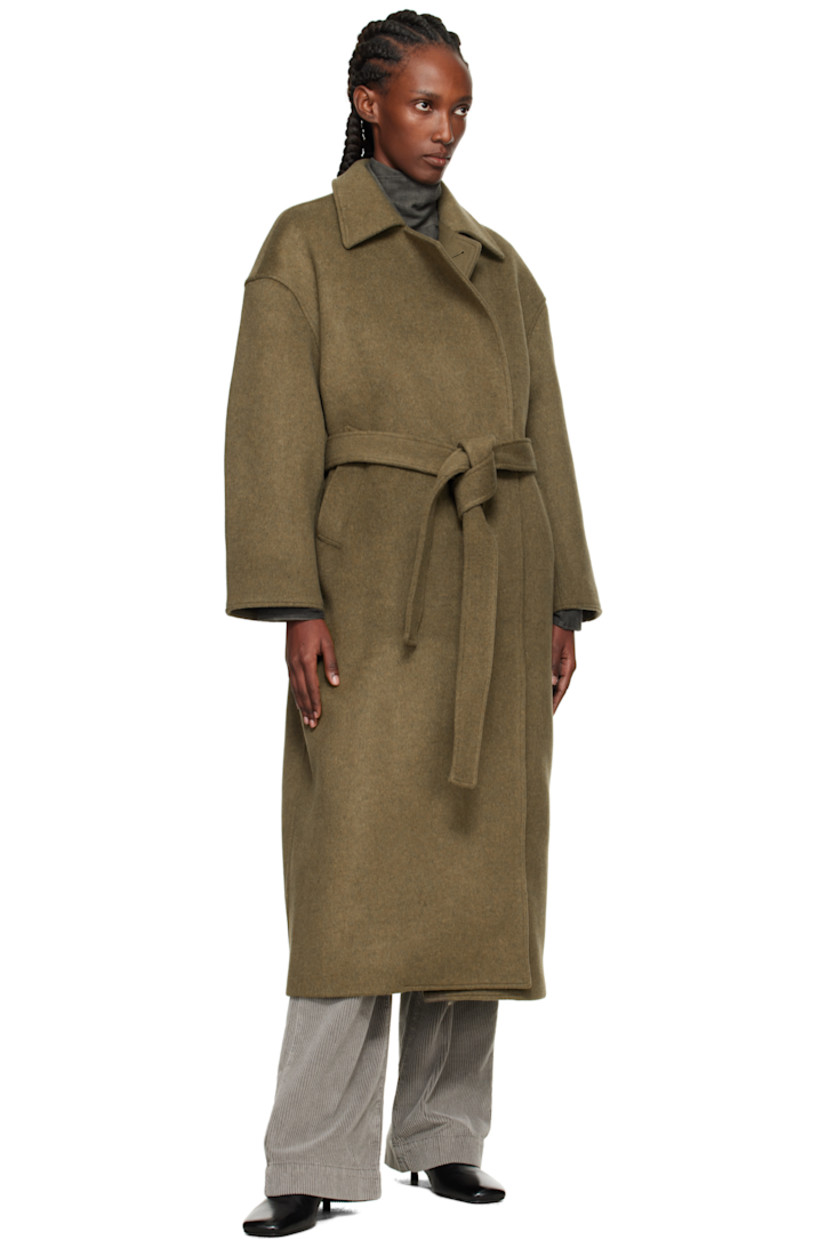 Wool-blend melton coat. 

· Spread collar 
· Concealed double-breasted button closure
· Welt pockets at waist
· Belt loops at waist 
· Detachable self-tie belt 
· Full satin twill lining
· Corozo hardware 
 
Supplier color: Disruptive moss kilo melton