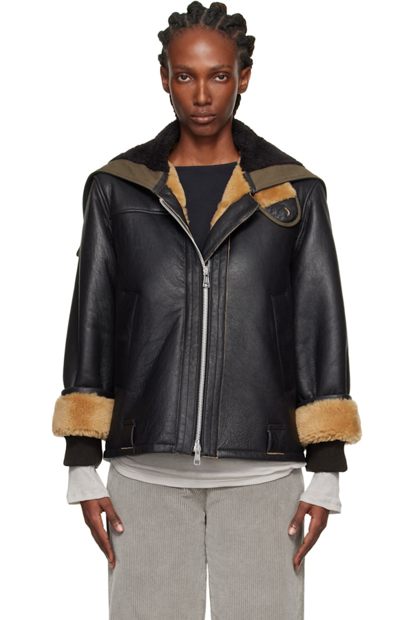 Grained lambskin jacket. 

· Zip vent at hood
· Throat guard at stand collar 
· Two-way zip closure 
· Welt pockets and belt loops at waist
· Inset rib-knit cuffs
· Cattle horn hardware

Supplier color: Natural aviator shearling