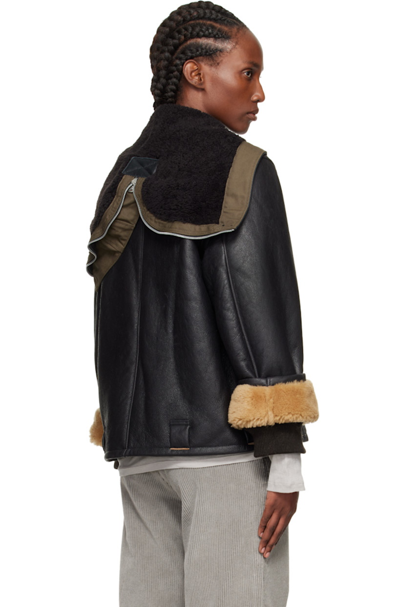 Grained lambskin jacket. 

· Zip vent at hood
· Throat guard at stand collar 
· Two-way zip closure 
· Welt pockets and belt loops at waist
· Inset rib-knit cuffs
· Cattle horn hardware

Supplier color: Natural aviator shearling