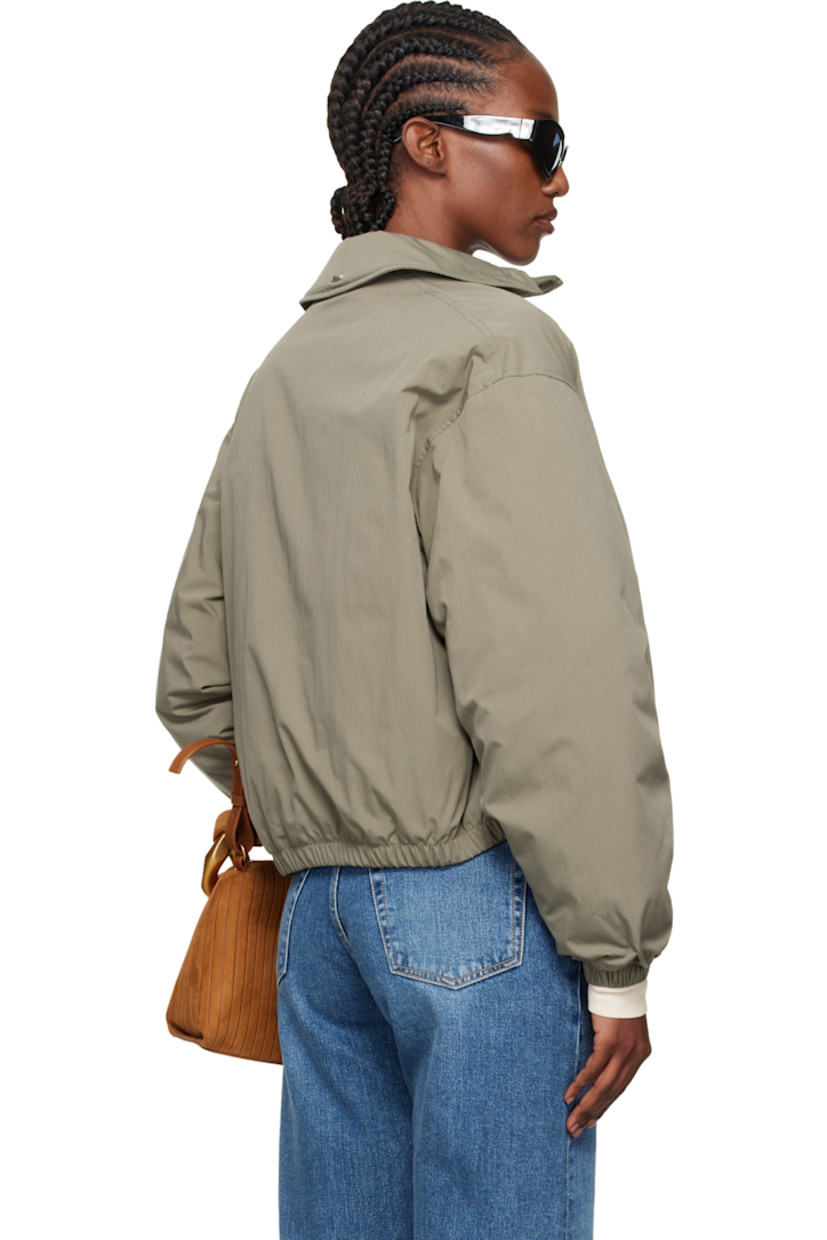 Insulated cotton- and nylon-blend taffeta jacket.

· Subtle brown-to-red iridescent solaro-style coloration
· Press-stud throat guard at spread collar
· Two-way zip closure
· Welt pockets at front
· Elasticized hem and cuffs
· Cropped hem
· Zip pocket at interior
· Full quilted satin lining

Supplier color: Solaro safe tide cotton nylon