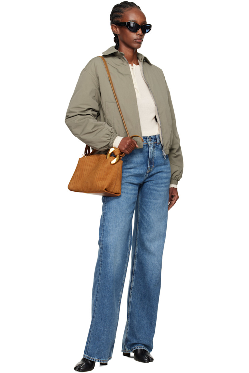 Insulated cotton- and nylon-blend taffeta jacket.

· Subtle brown-to-red iridescent solaro-style coloration
· Press-stud throat guard at spread collar
· Two-way zip closure
· Welt pockets at front
· Elasticized hem and cuffs
· Cropped hem
· Zip pocket at interior
· Full quilted satin lining

Supplier color: Solaro safe tide cotton nylon