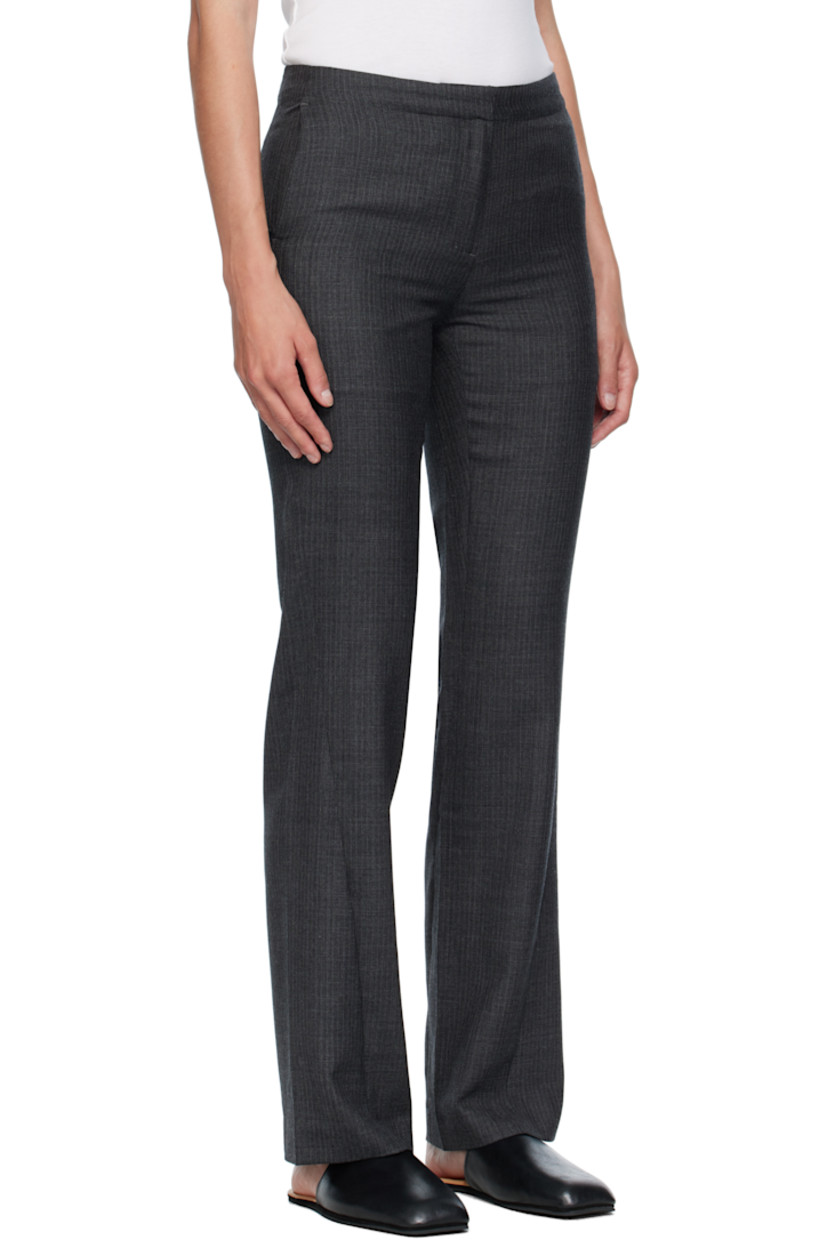 Straight-leg virgin wool herringbone trousers.

· Low-rise
· Three-pocket styling
· Zip fly
· Twisted outseams
· Darts at back waist

Supplier color: Smoke grey micro herringbone
