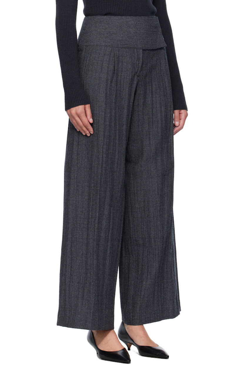 Crinkled plain-woven virgin wool trousers.

· Wide-leg 
· Zip fly 
· Pleats at front 

Supplier color: Stone grey plisse wool
