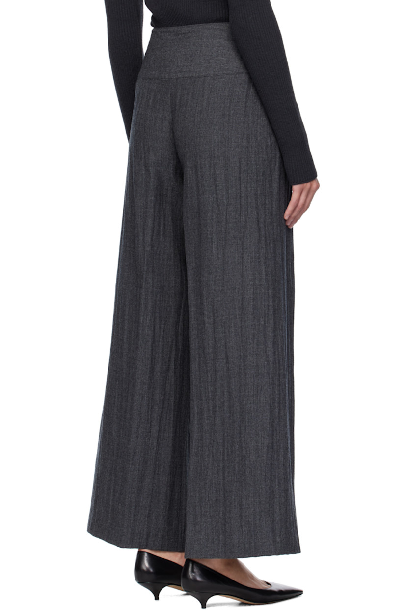 Crinkled plain-woven virgin wool trousers.

· Wide-leg 
· Zip fly 
· Pleats at front 

Supplier color: Stone grey plisse wool