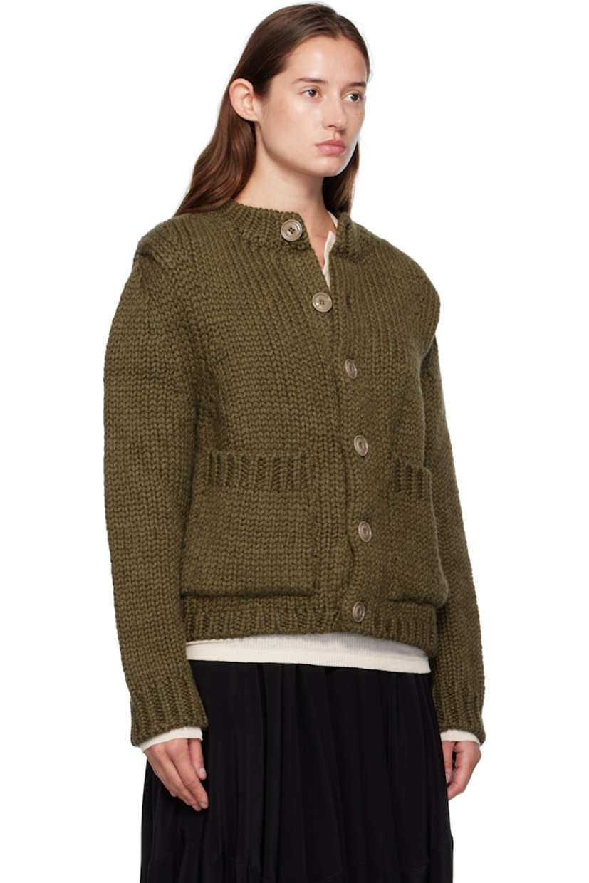 Heavyweight knit wool- and alpaca-blend cardigan.

· Rib-knit crewneck, hem, and cuffs
· Button closure
· Patch pockets at front
· Corozo hardware

Supplier color: Olive mega alpaca