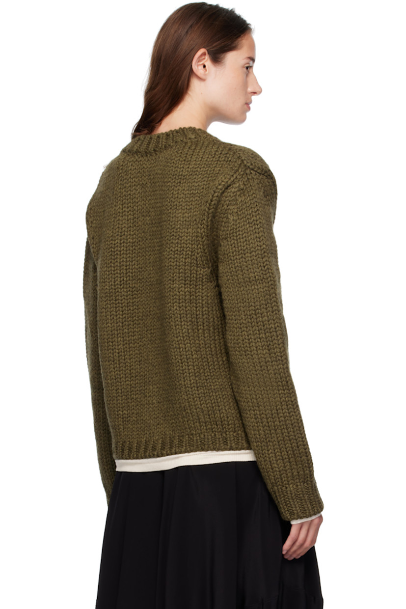 Heavyweight knit wool- and alpaca-blend cardigan.

· Rib-knit crewneck, hem, and cuffs
· Button closure
· Patch pockets at front
· Corozo hardware

Supplier color: Olive mega alpaca