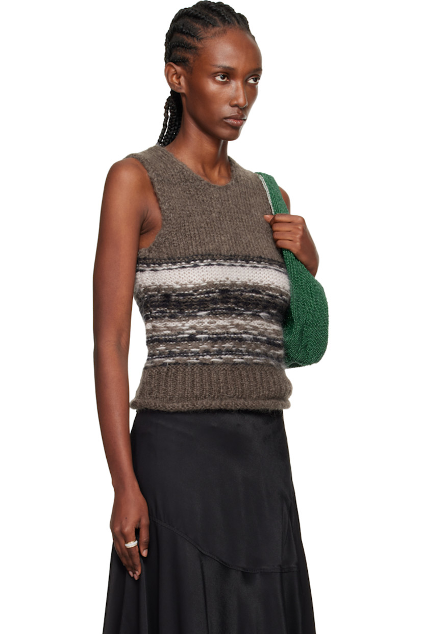 Knit mohair- and wool-blend vest.

· Intarsia knit stripes throughout
· Crewneck
· Rolled edge at rib-knit hem

Supplier color: Blur fair isle